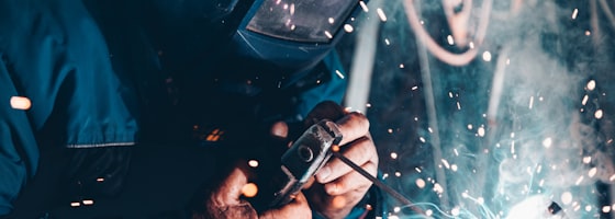 Industrial machinery on a factory floor with safety equipment visible