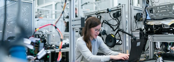 Technician working on industrial equipment up close